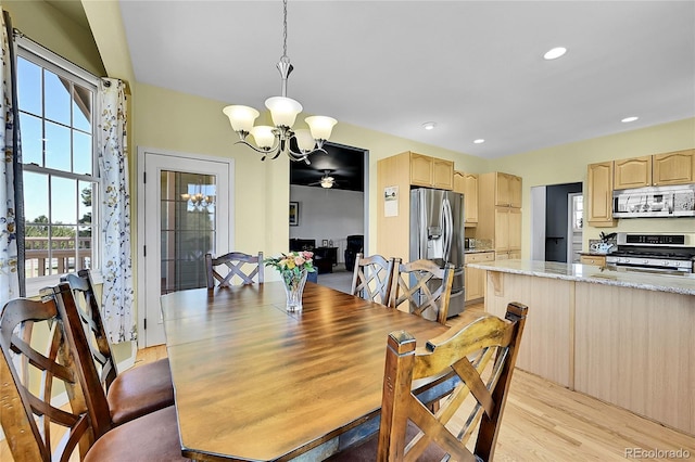 41479 Countryside Cir, Parker, CO 80138 - dining area featuring a chandelier, light wood finished floors, and recessed lighting