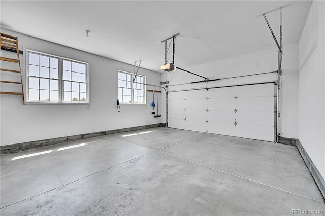 41479 Countryside Cir, Parker, CO 80138 - garage featuring a garage door opener and baseboards