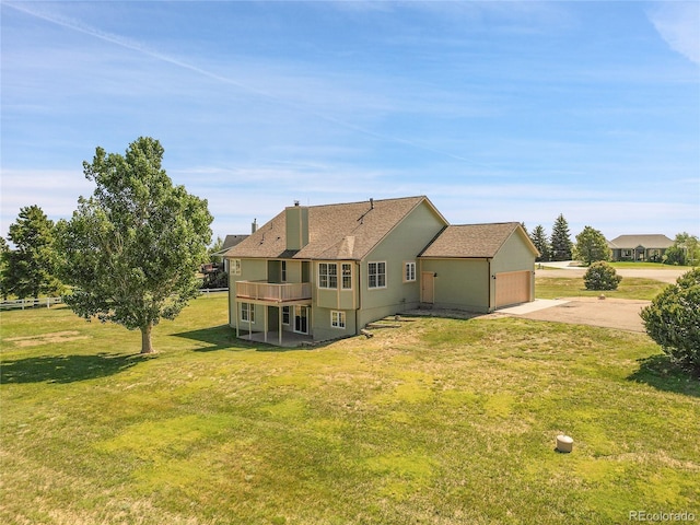41479 Countryside Cir, Parker, CO 80138 - rear view of property with concrete driveway, a yard, a chimney, a garage, and a shingled roof