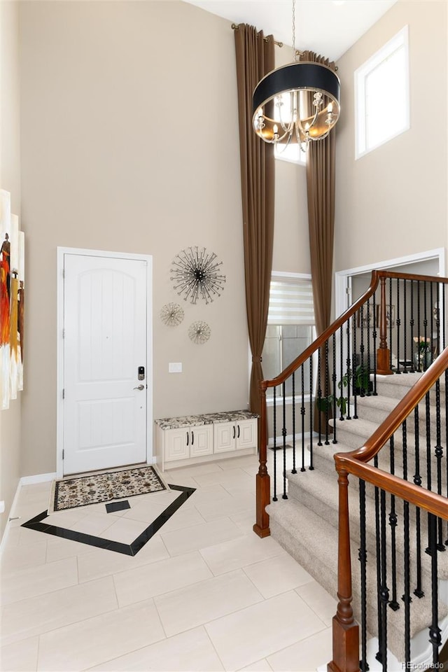 entrance foyer featuring a chandelier