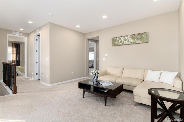 living room with light colored carpet