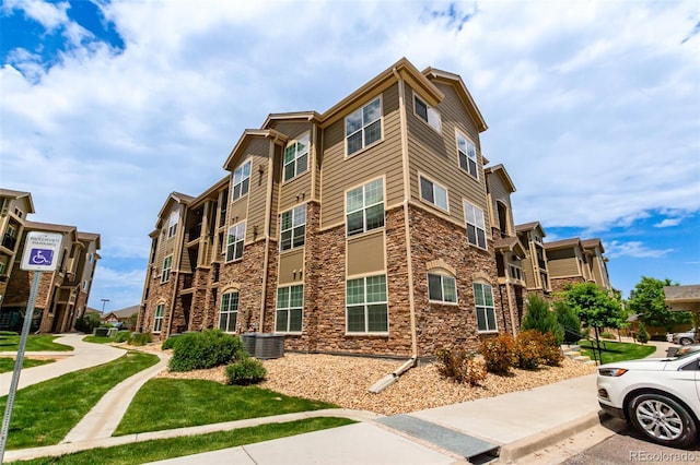 9185 Wilde Ln Unit 101, Parker, CO 80134 - view of property featuring central air condition unit