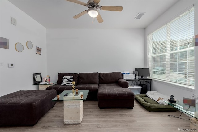 9185 Wilde Ln Unit 101, Parker, CO 80134 - living room featuring light wood-type flooring and ceiling fan