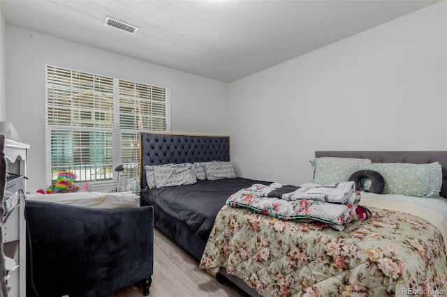 9185 Wilde Ln Unit 101, Parker, CO 80134 - bedroom with wood finished floors