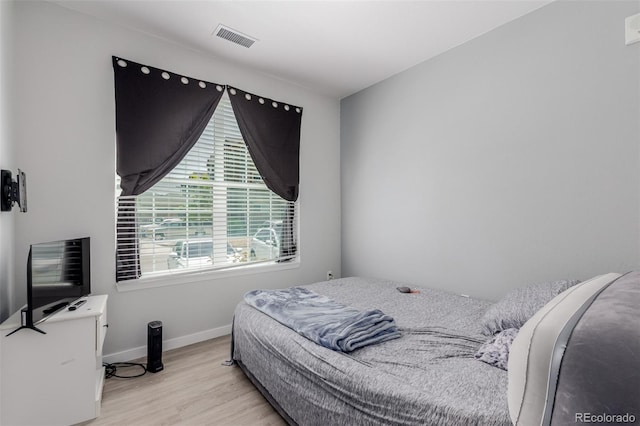 9185 Wilde Ln Unit 101, Parker, CO 80134 - bedroom with light wood-type flooring and baseboards