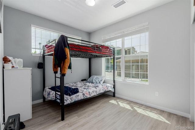 9185 Wilde Ln Unit 101, Parker, CO 80134 - bedroom featuring wood finished floors and baseboards