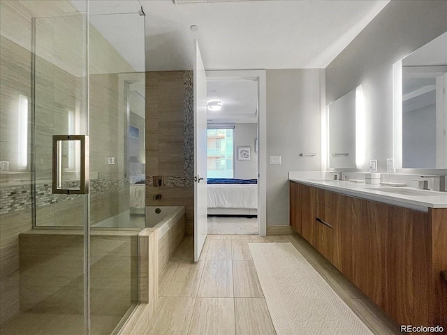 bathroom featuring tile patterned floors and double sink vanity