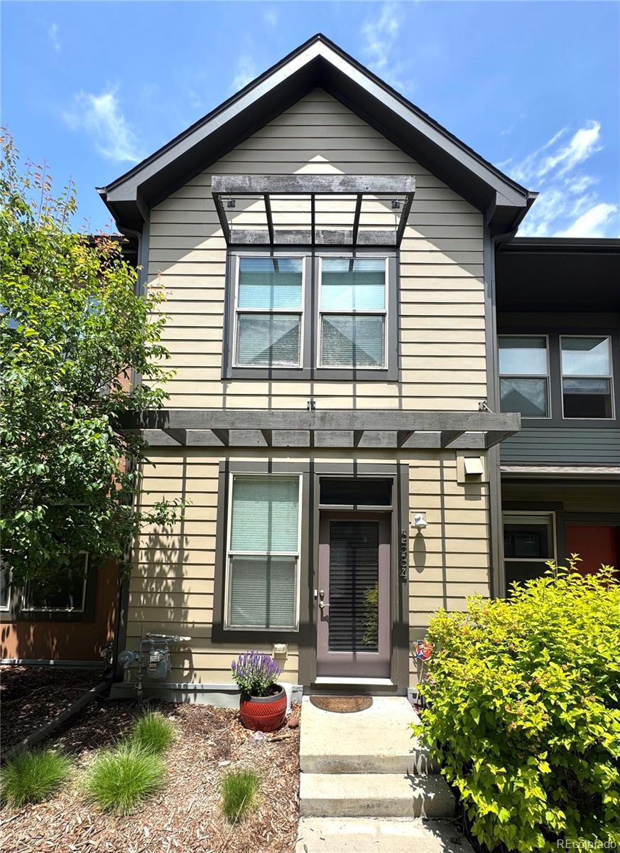 3584 Central Park Blvd, Denver, CO 80238 - view of front facade featuring a pergola