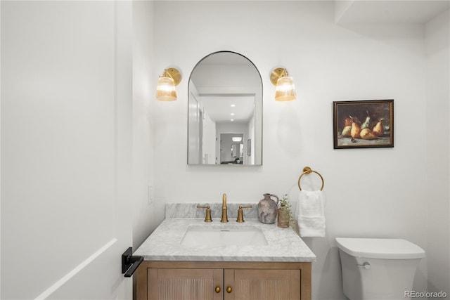 5944 E Irwin Pl, Centennial, CO 80112 - half bathroom with vanity and toilet