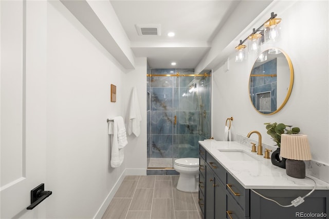 5944 E Irwin Pl, Centennial, CO 80112 - bathroom featuring vanity, a marble finish shower, and recessed lighting