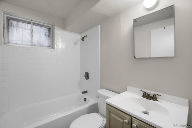 full bathroom with vanity, toilet, and tiled shower / bath combo