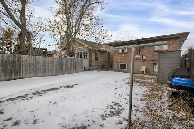 view of snow covered property