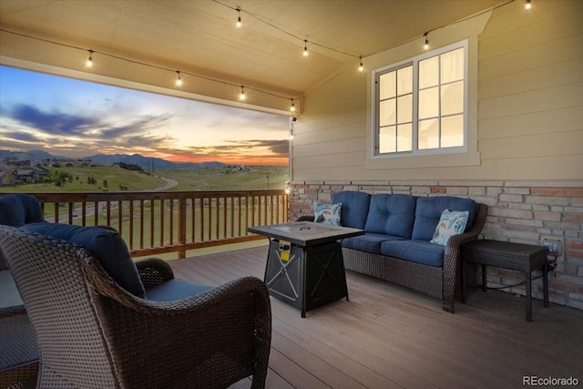 17102 W 85th Pl, Arvada, CO 80007 - wooden deck with outdoor lounge area and a mountain view