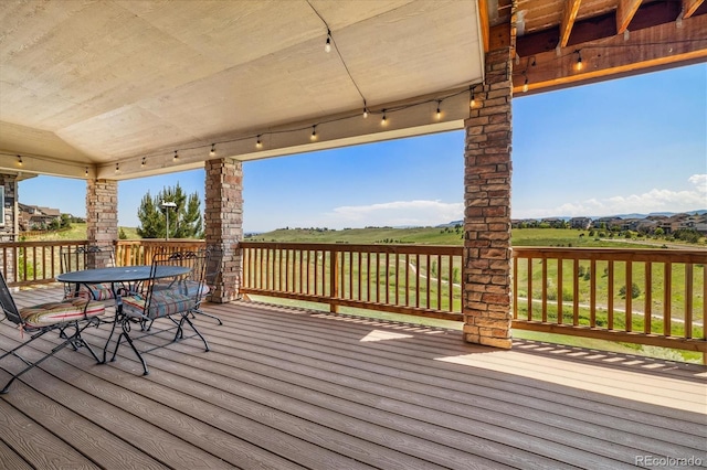 17102 W 85th Pl, Arvada, CO 80007 - wooden deck featuring outdoor dining space