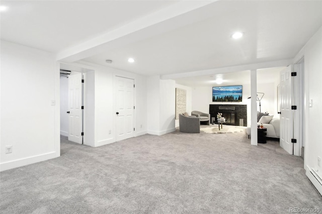 living room featuring light carpet and a baseboard radiator