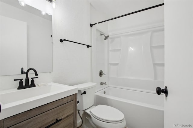 full bath featuring washtub / shower combination, toilet, and vanity
