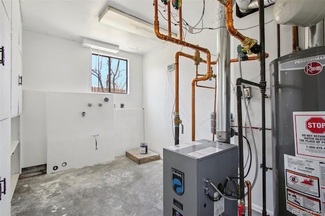 utility room with water heater