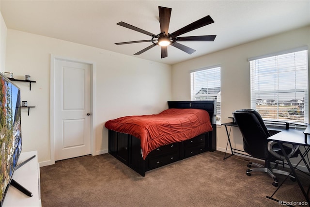 bedroom featuring ceiling fan and carpet floors