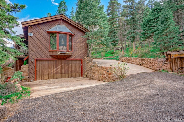 view of home's exterior featuring a garage