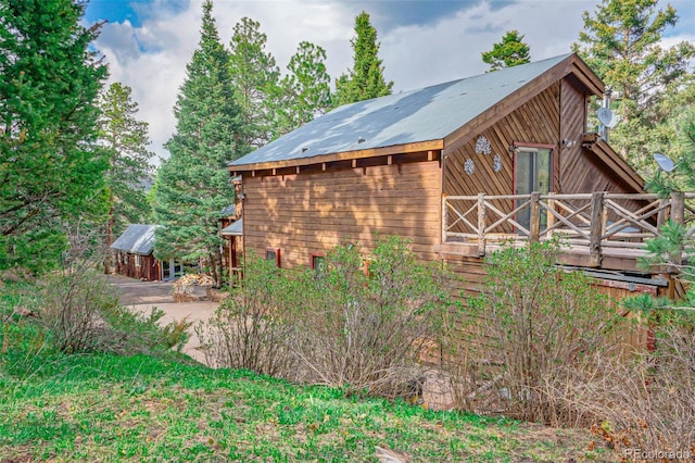 exterior space featuring an outbuilding