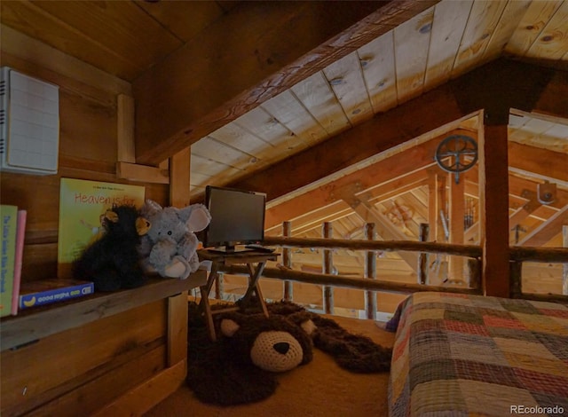 bedroom featuring vaulted ceiling and wooden ceiling