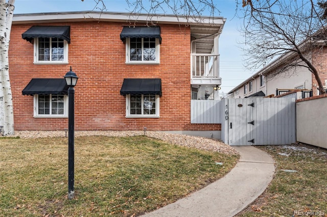 160 Jackson St Unit 5, Denver, CO 80206 - view of front facade featuring a gate and brick siding