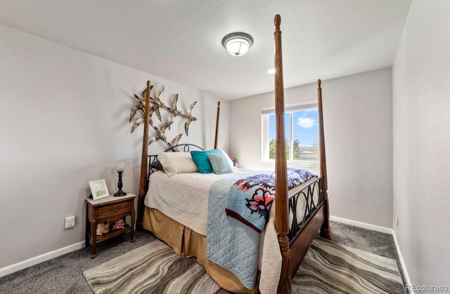 1882 N Rough Rock Ln, Pueblo West, CO 81007 - bedroom featuring baseboards and carpet flooring