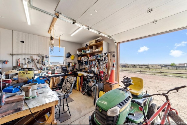 1882 N Rough Rock Ln, Pueblo West, CO 81007 - garage featuring a workshop area