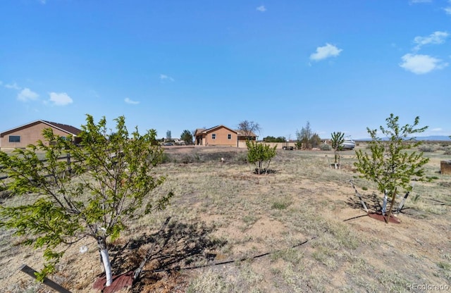 1882 N Rough Rock Ln, Pueblo West, CO 81007 - view of yard with a rural view