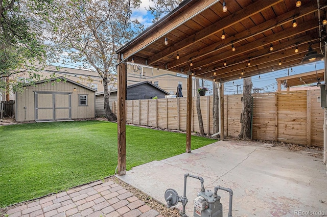 view of patio / terrace with a shed and an outbuilding