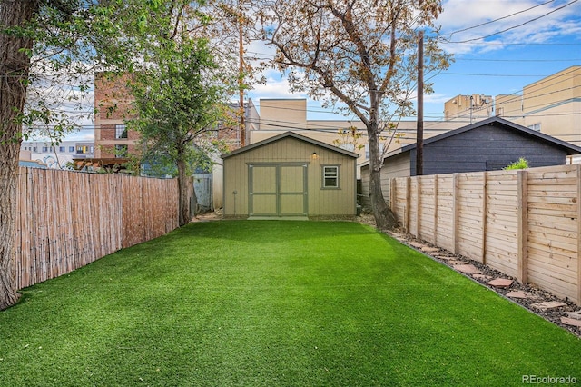 view of yard with a storage unit and an outdoor structure
