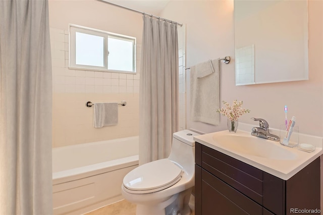 bathroom with toilet, shower / tub combo with curtain, and vanity