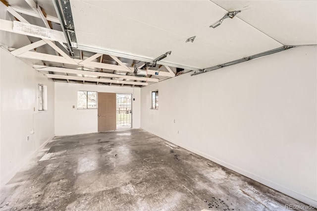 garage featuring baseboards