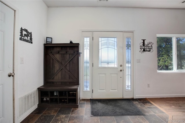 777 Deerview Dr, Florissant, CO 80816 - entrance foyer featuring baseboards and dark stone finish floors