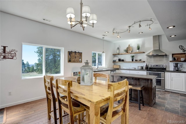 777 Deerview Dr, Florissant, CO 80816 - dining area featuring a chandelier, recessed lighting, and baseboards
