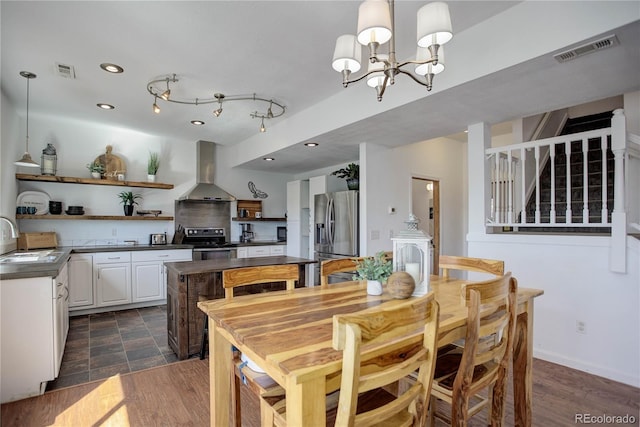 777 Deerview Dr, Florissant, CO 80816 - dining area featuring a chandelier, stairs, and recessed lighting