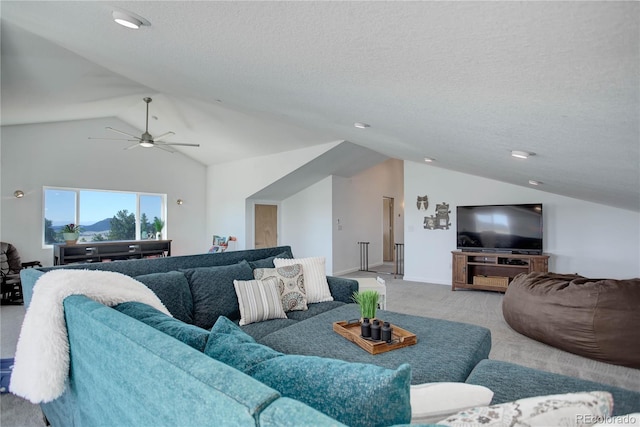 777 Deerview Dr, Florissant, CO 80816 - living area featuring vaulted ceiling, carpet floors, ceiling fan, a textured ceiling, and baseboards
