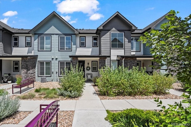 19592 W 93rd Pl Unit C, Arvada, CO 80007 - townhome / multi-family property with stone siding