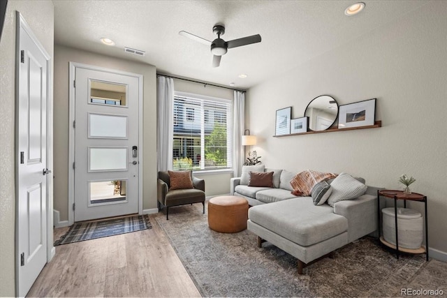 19592 W 93rd Pl Unit C, Arvada, CO 80007 - living area featuring wood finished floors, ceiling fan, and recessed lighting