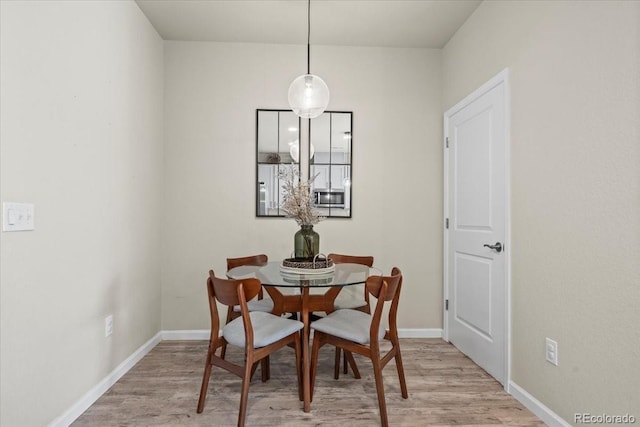 19592 W 93rd Pl Unit C, Arvada, CO 80007 - dining area featuring light wood finished floors