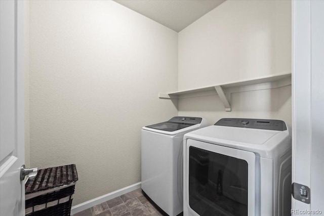 19592 W 93rd Pl Unit C, Arvada, CO 80007 - laundry room featuring washing machine and clothes dryer and baseboards