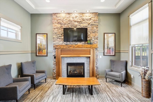 19592 W 93rd Pl Unit C, Arvada, CO 80007 - sitting room with a tile fireplace, wood finished floors, recessed lighting, and a raised ceiling