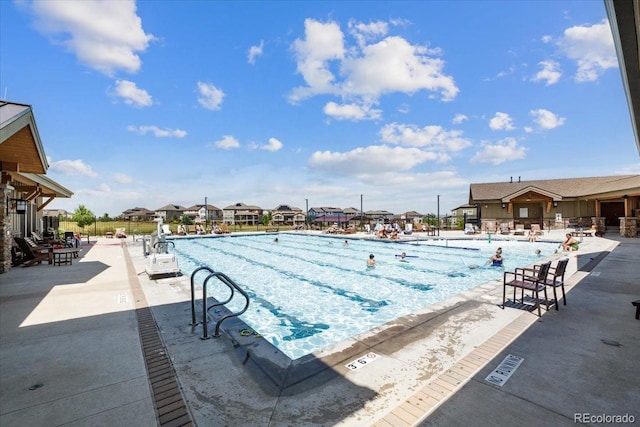 19592 W 93rd Pl Unit C, Arvada, CO 80007 - community pool with a patio and a residential view