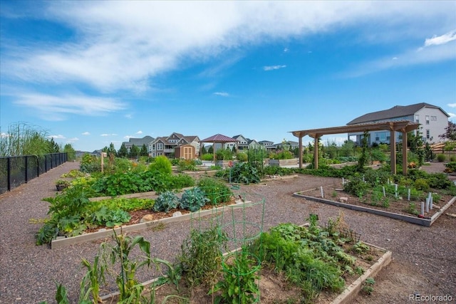 19592 W 93rd Pl Unit C, Arvada, CO 80007 - view of yard featuring a garden and a residential view