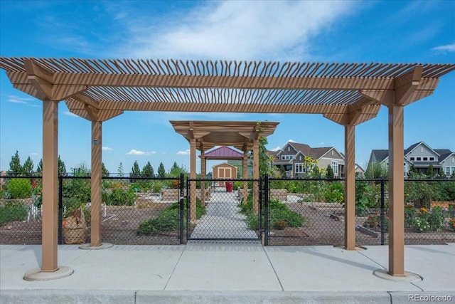 19592 W 93rd Pl Unit C, Arvada, CO 80007 - view of patio / terrace with a gate and a pergola