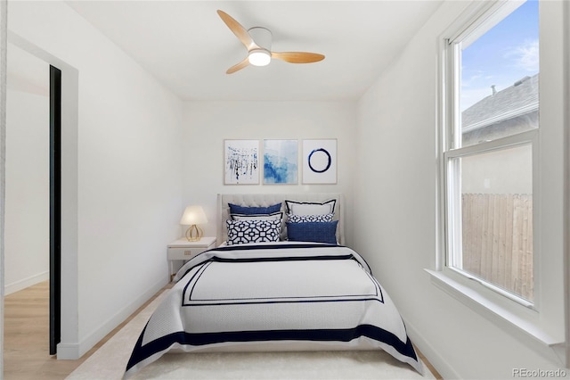 bedroom featuring ceiling fan and light wood-type flooring