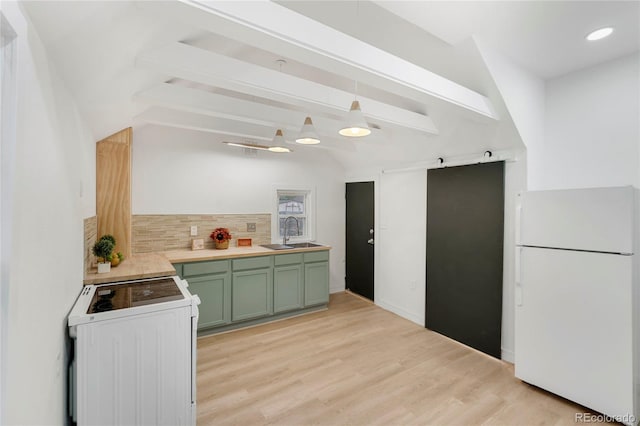 kitchen featuring sink, backsplash, range, beam ceiling, and white refrigerator