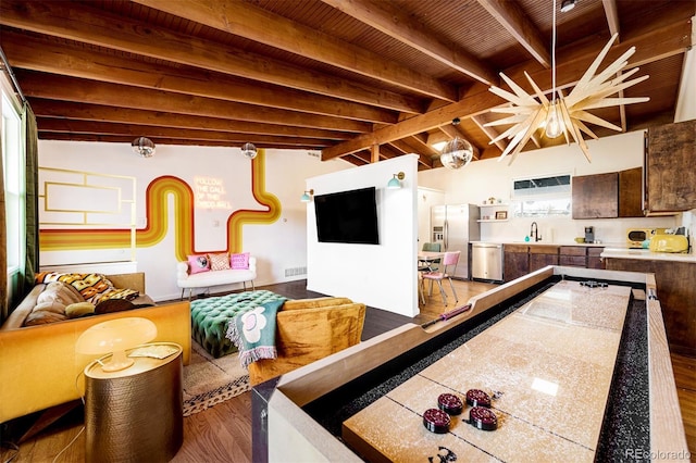 game room featuring wood ceiling, vaulted ceiling with beams, wood finished floors, and a sink