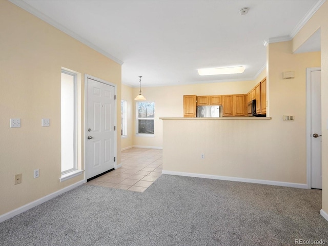 unfurnished living room featuring light carpet, crown molding, and baseboards