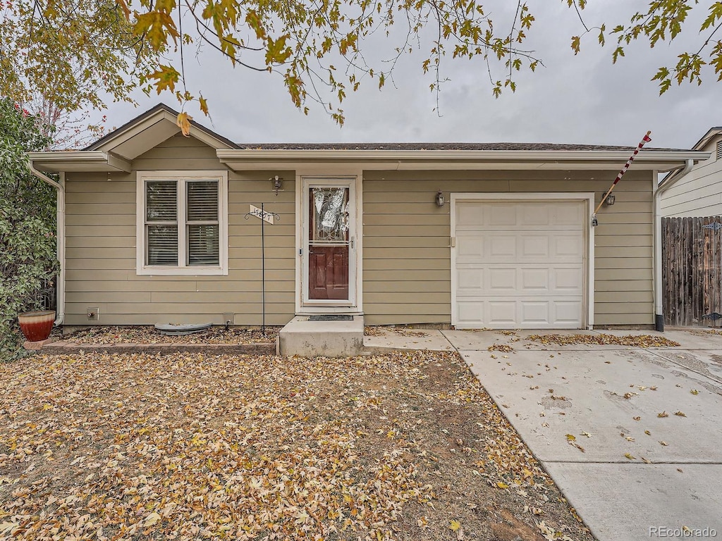 single story home with a garage